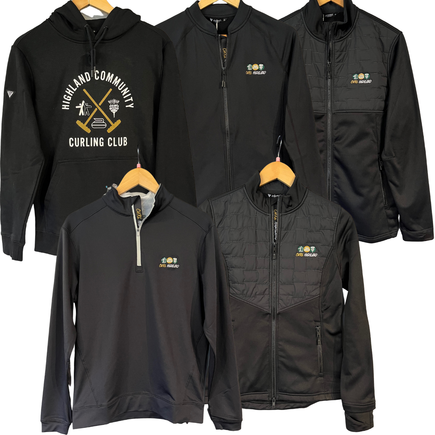 Collection of black jackets and hoodies on hangers with logos on a white background